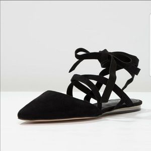 BCBG lace up black leather slippers